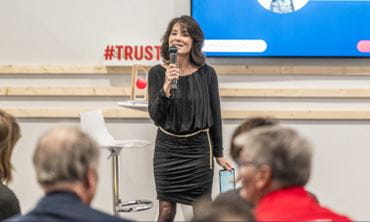 Speaker on stage for the TRUSTECH Innovation Awards Ceremony